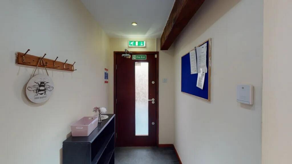 A welcoming hallway featuring stylish decor, am...