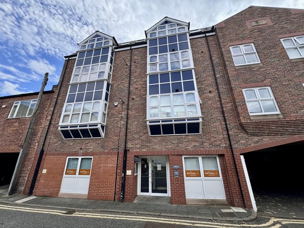 A modern exterior view of the property showcasi...