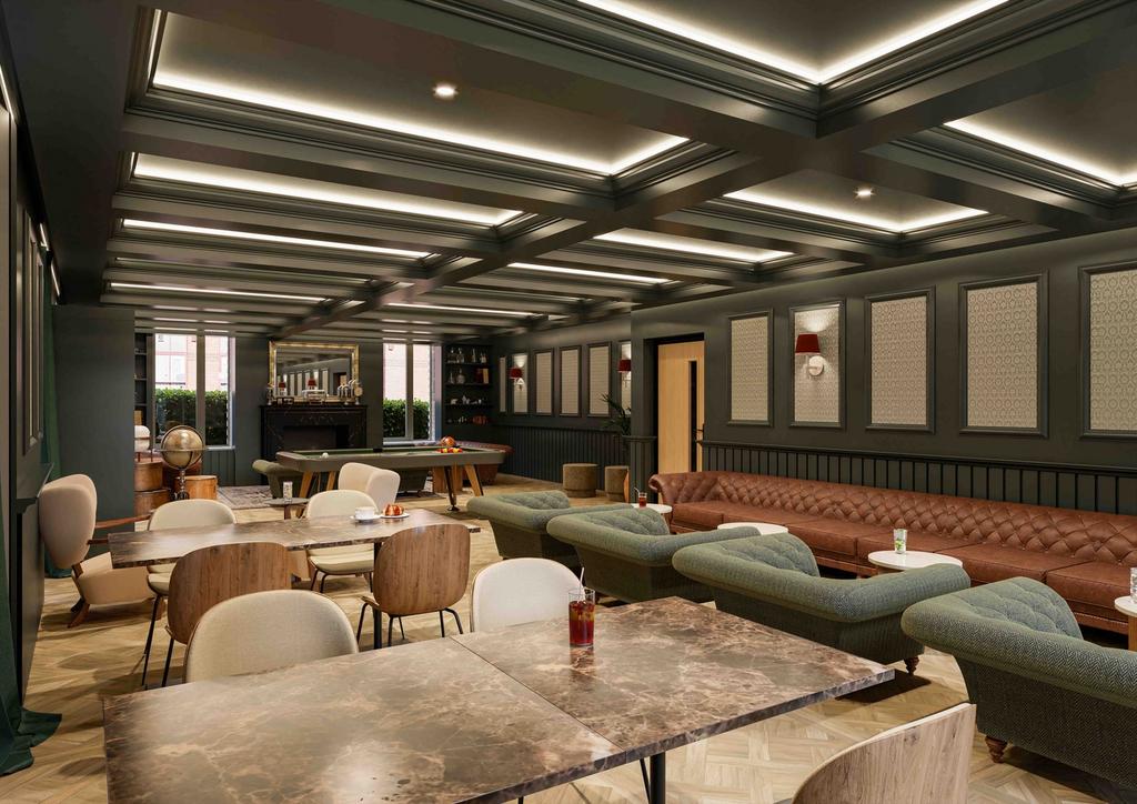 A stylish and spacious communal lounge area per...