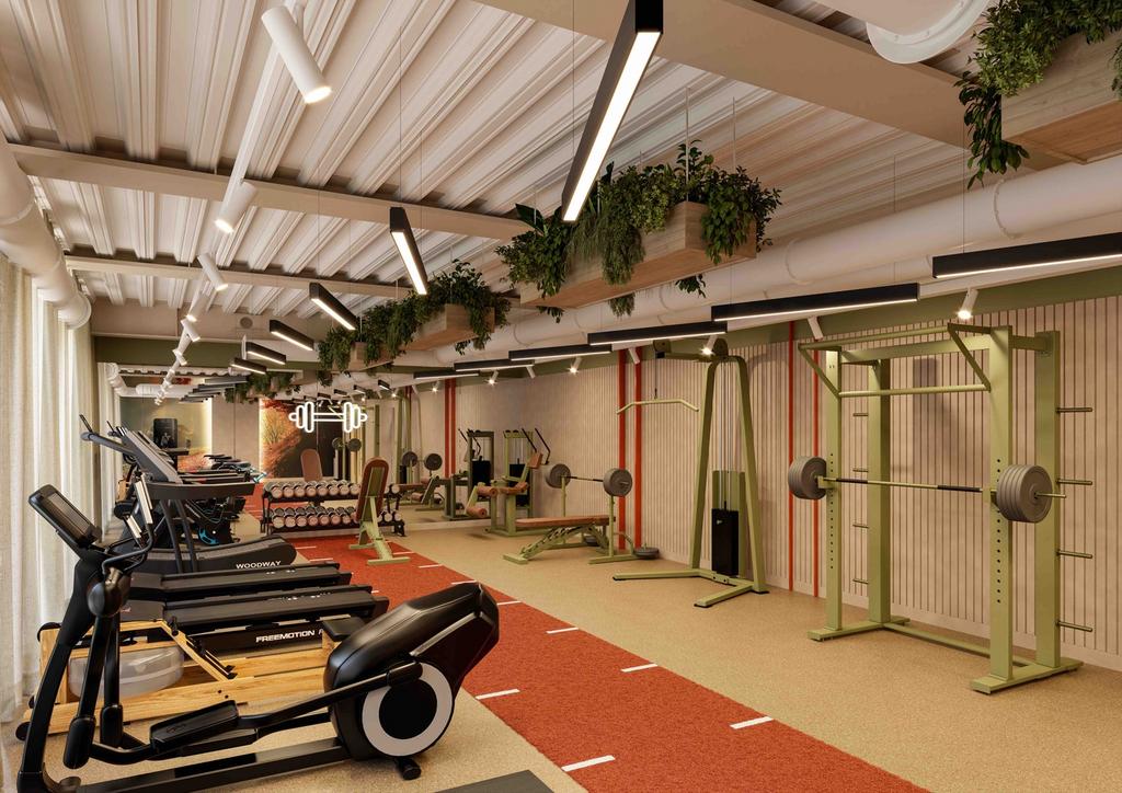 A spacious and well-equipped gym featuring mode...