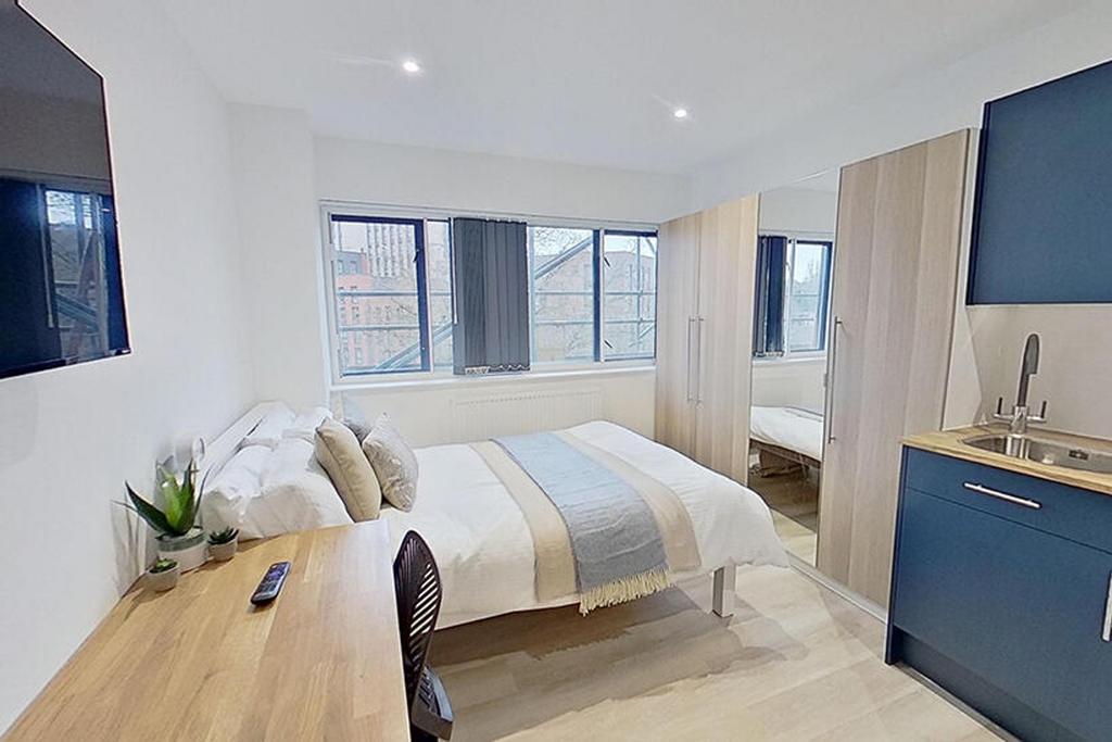 Cozy and modern double bedroom featuring ample ...