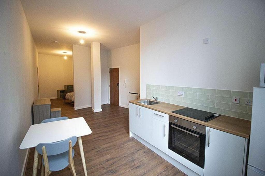 This charming kitchen area features modern appl...