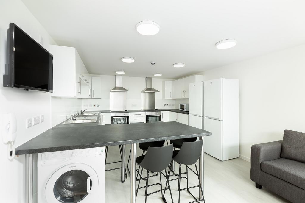 A modern and spacious kitchen, perfect for stud...