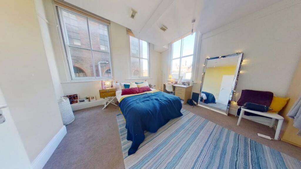 A spacious and inviting large double bedroom wi...
