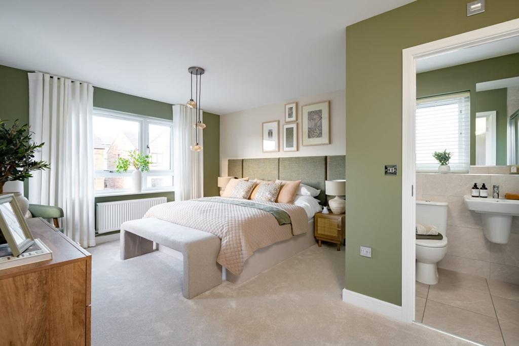 A large main bedroom, boasting with natural light