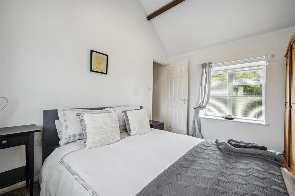 Bedroom Four to front window.jpg