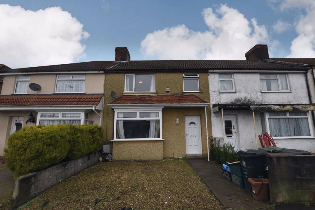 Charming front view of a terraced property, fea...
