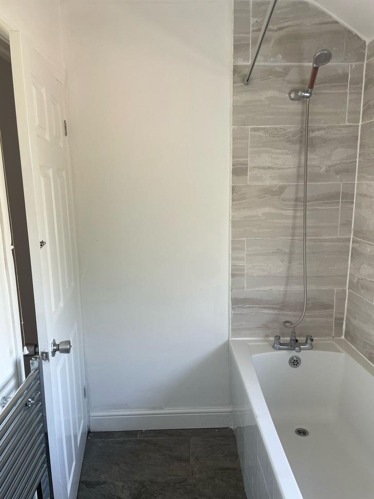 A beautifully designed bathroom featuring a sty...