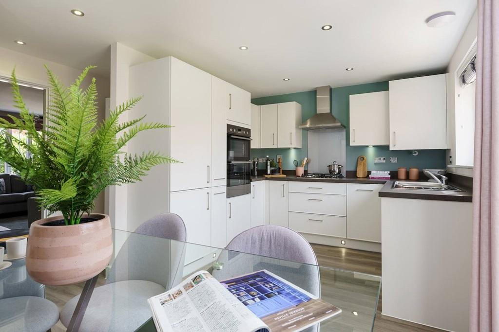 The kitchen/dining area is perfect for hosting...