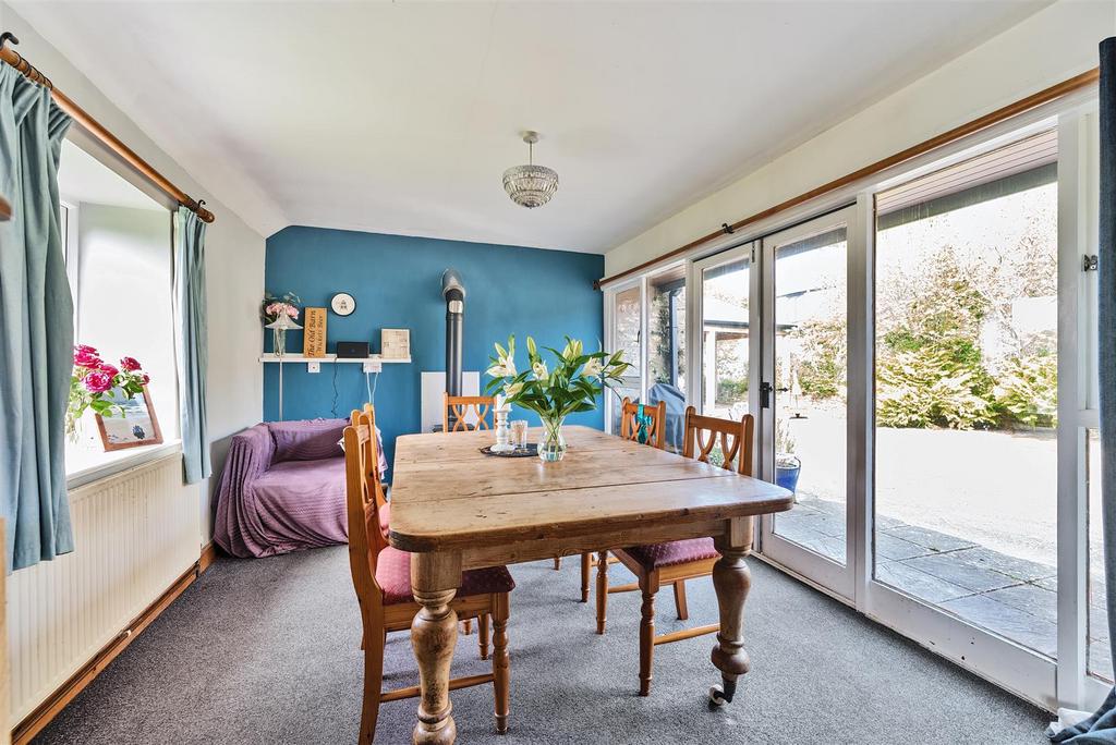 Dining Room with doors to the front courtyard