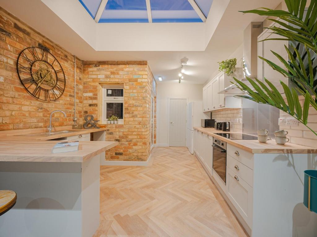 A beautifully designed kitchen featuring modern...