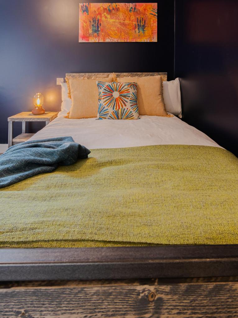 This beautifully styled double bedroom features...