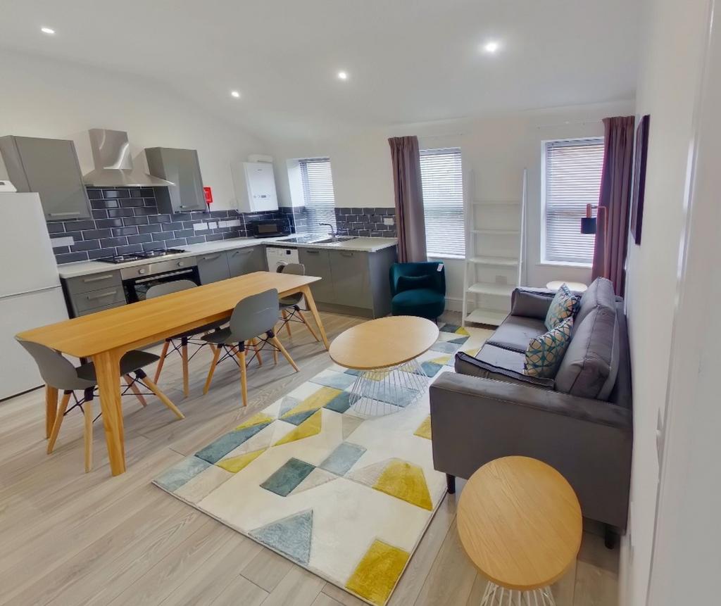 A spacious and stylish modern living room, perf...