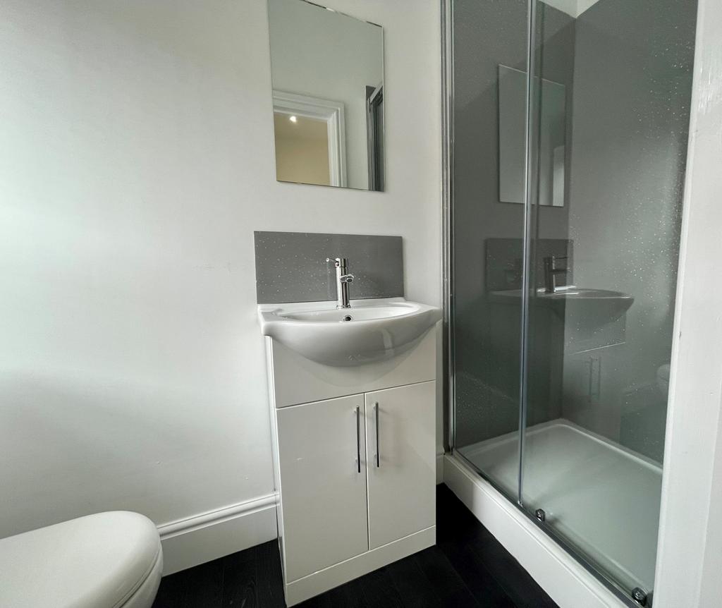 A modern and well-maintained bathroom featuring...
