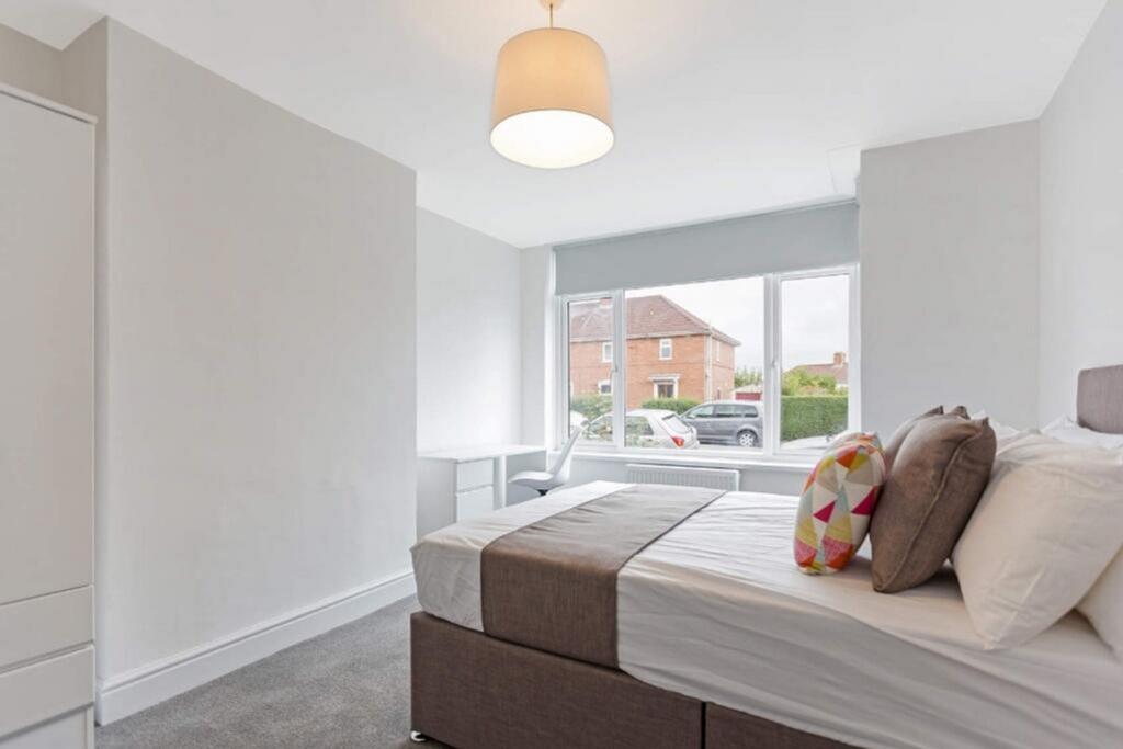 Bright and inviting double bedroom featuring a ...