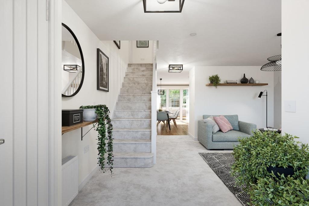An open plan layout floods downstairs with light