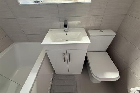 38 West Street, Lees, Oldham, OL4 5AT