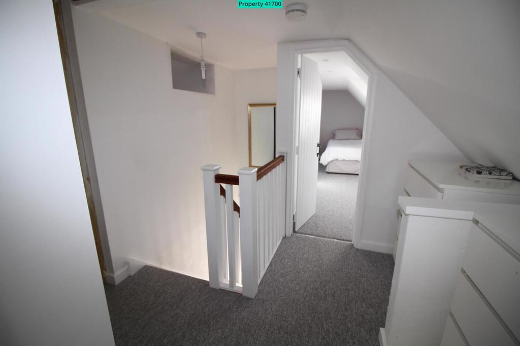Second Floor Hallway with storage
