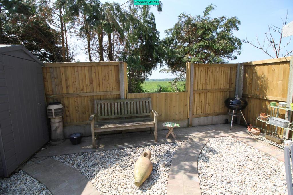 Garden drop-down fence with views across the filel
