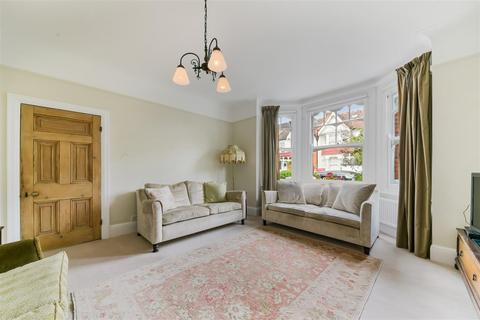 27 Dunmore Road, London, SW20 8TN