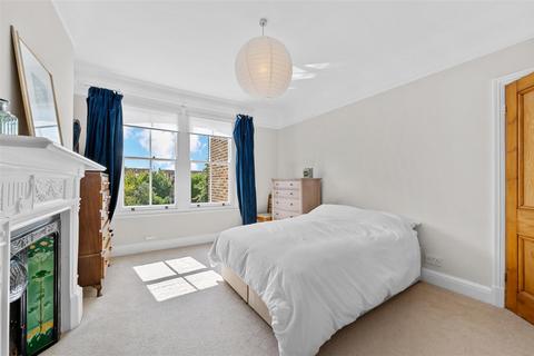 27 Dunmore Road, London, SW20 8TN