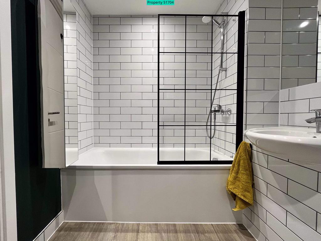 Shower above bath
