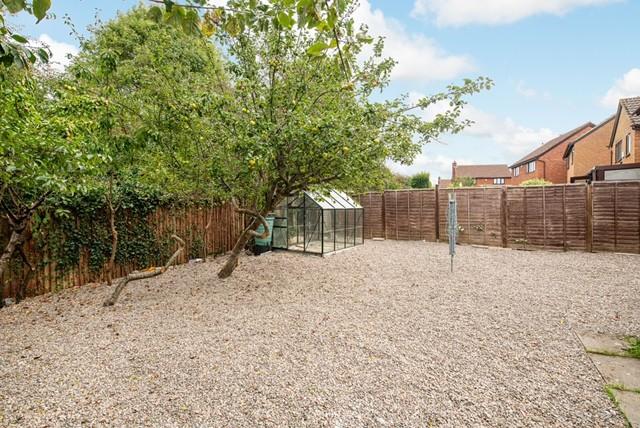 A charming garden space featuring a well-mainta...