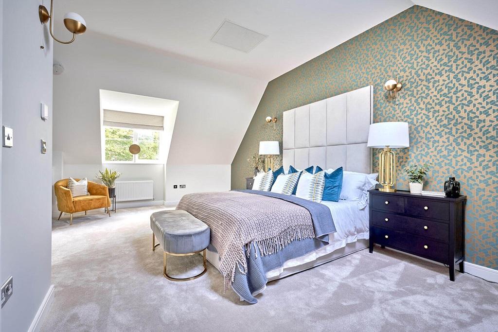 The main bedroom offers plenty of space to...