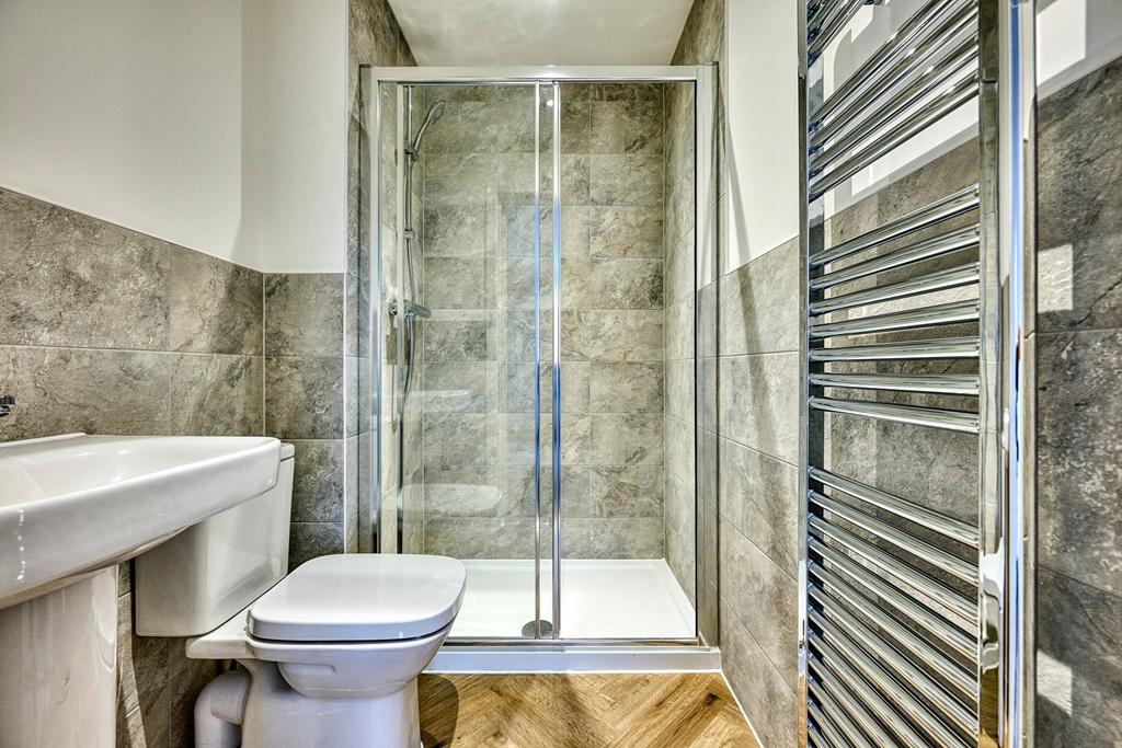 The en suite is also smartly finished