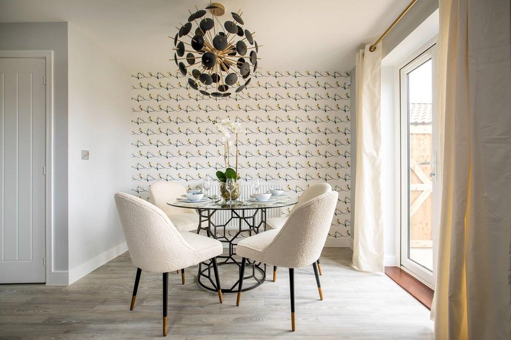 A light and airy dining area leading out to the...
