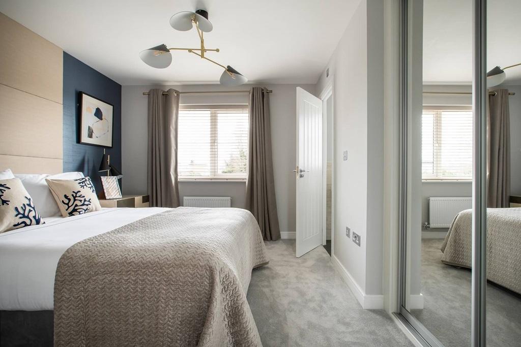 The main bedroom features an suite shower room...