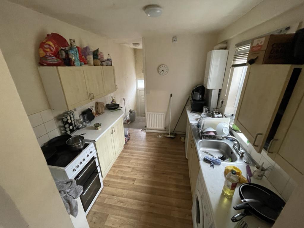 A functional and well-equipped kitchen with amp...