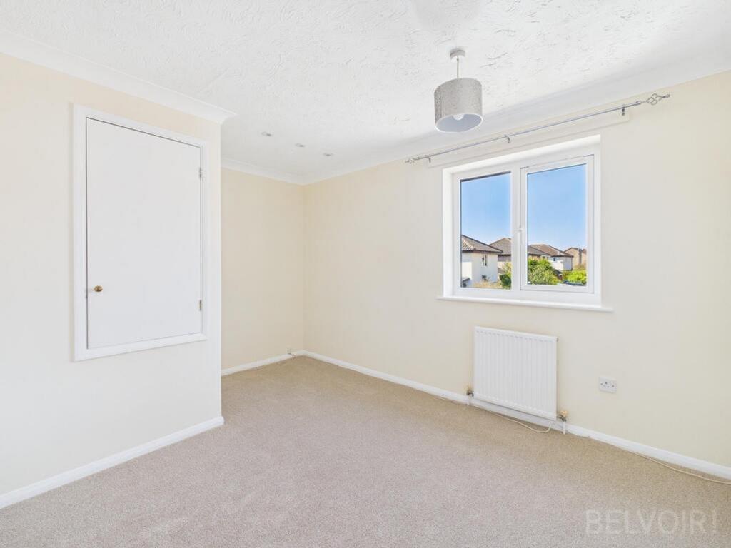 Bright and spacious double bedroom featuring la...