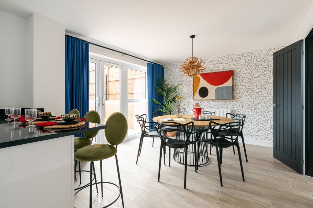 A spacious dining area  between the lounge and...