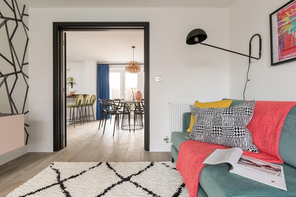 Double doors open up the lounge to the dining room