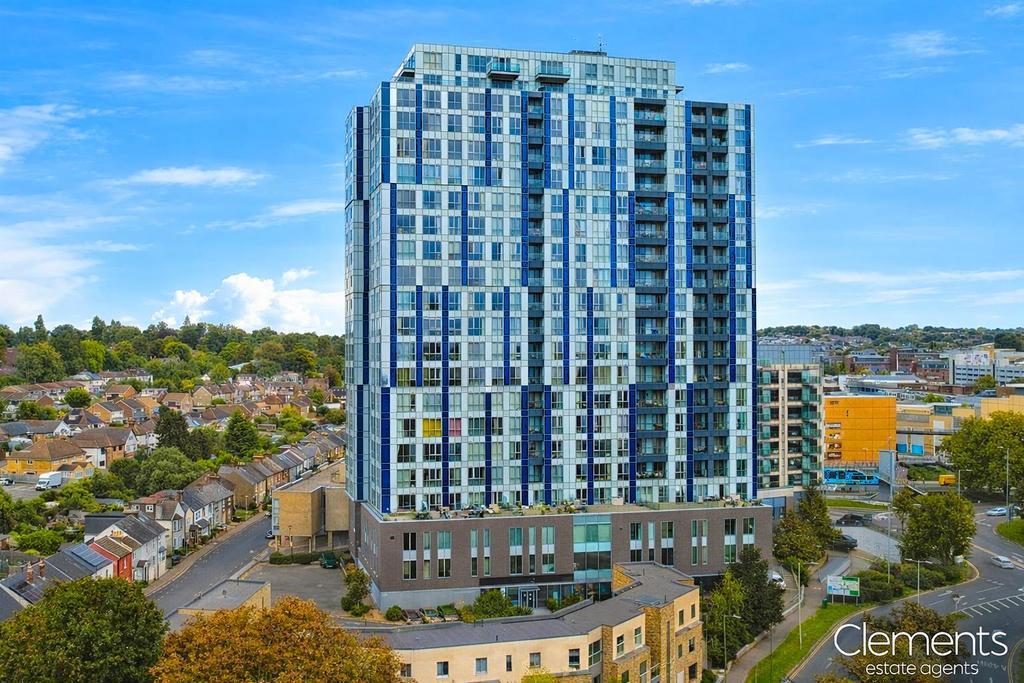 Modern high-rise over traditional suburb.png