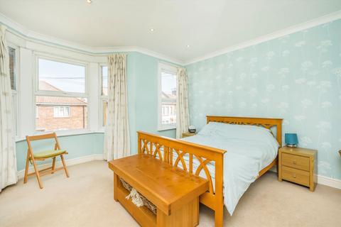 49 Quicks Road, London, SW19 1EY