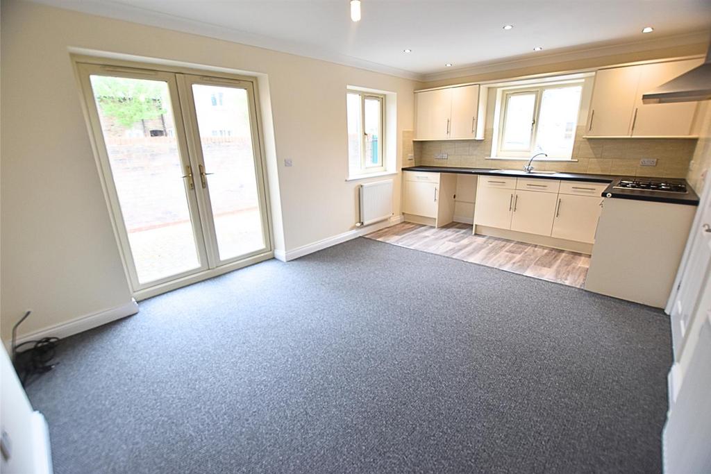 Living room with open plan kitchen area
