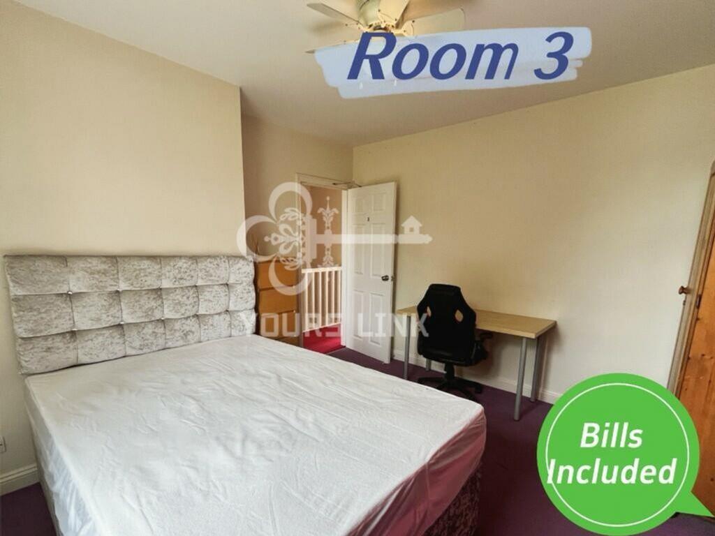 A spacious and inviting double bedroom, perfect...