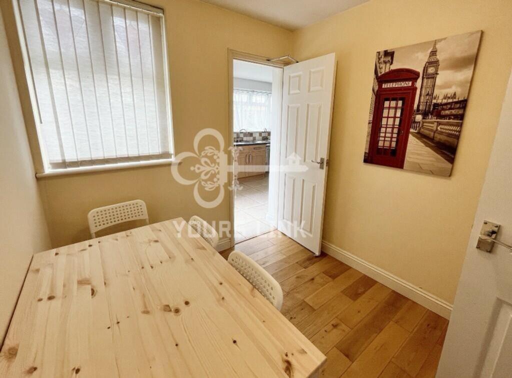 A bright and inviting kitchenette with modern d...