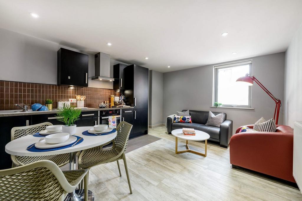 This modern kitchen seamlessly integrates funct...