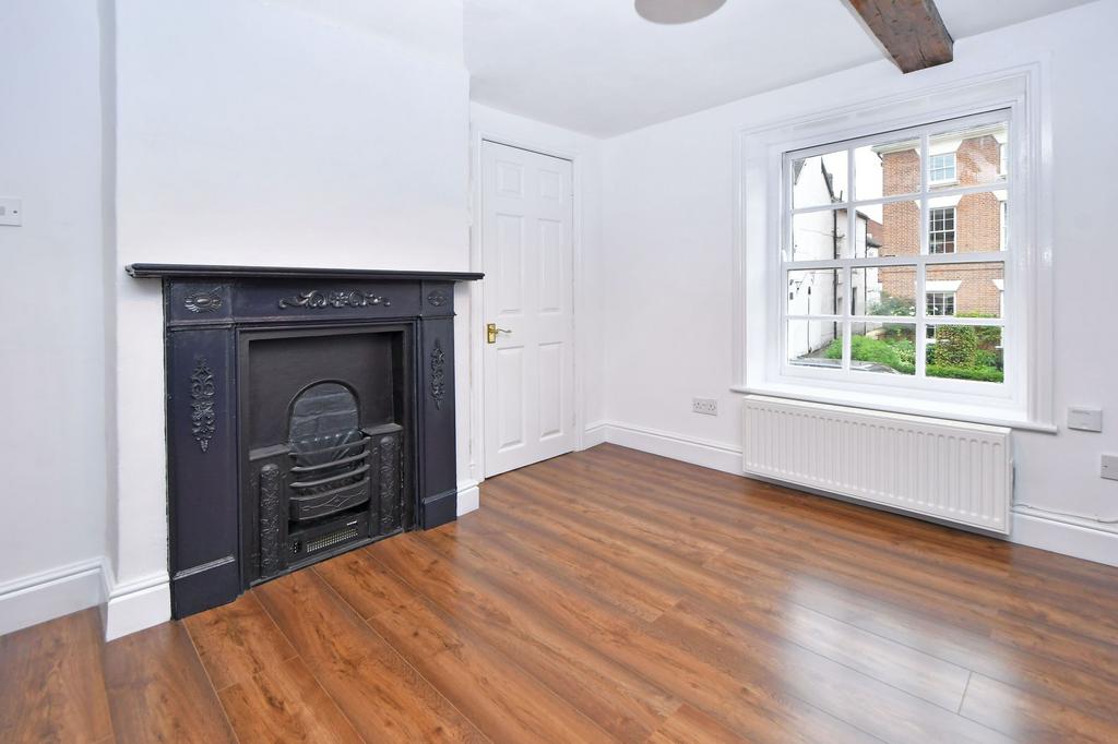 Attractive fireplace with concealed plinth heater