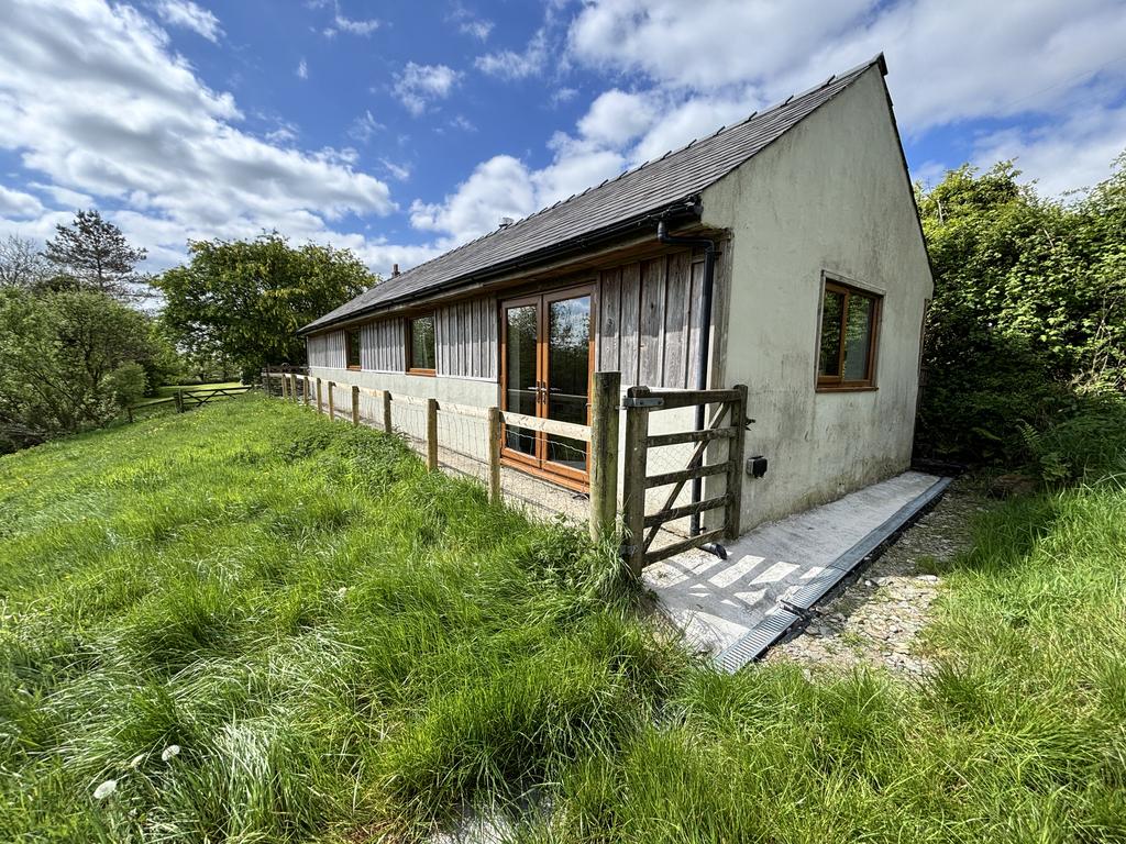 Outbuilding With Garage And Gymnasium