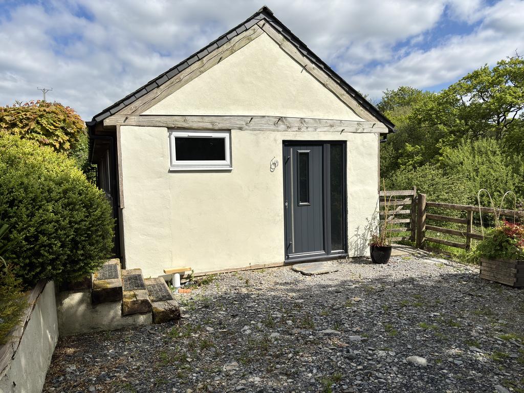 Outbuilding With Garage And Gymnasium