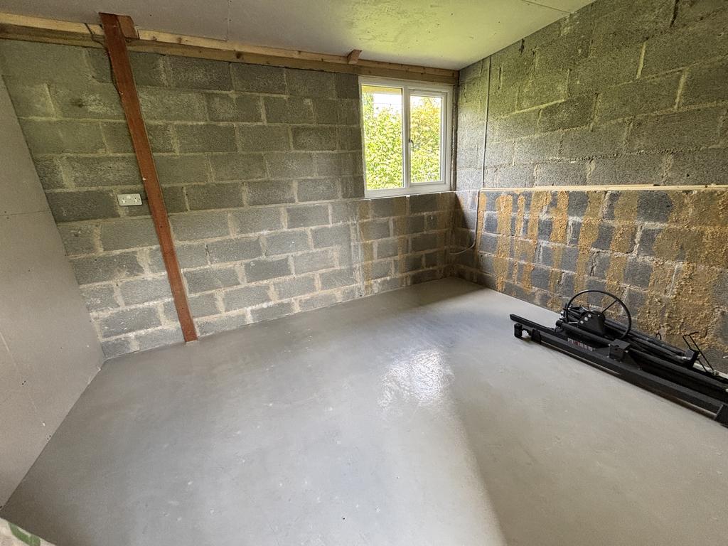Outbuilding With Garage And Gymnasium