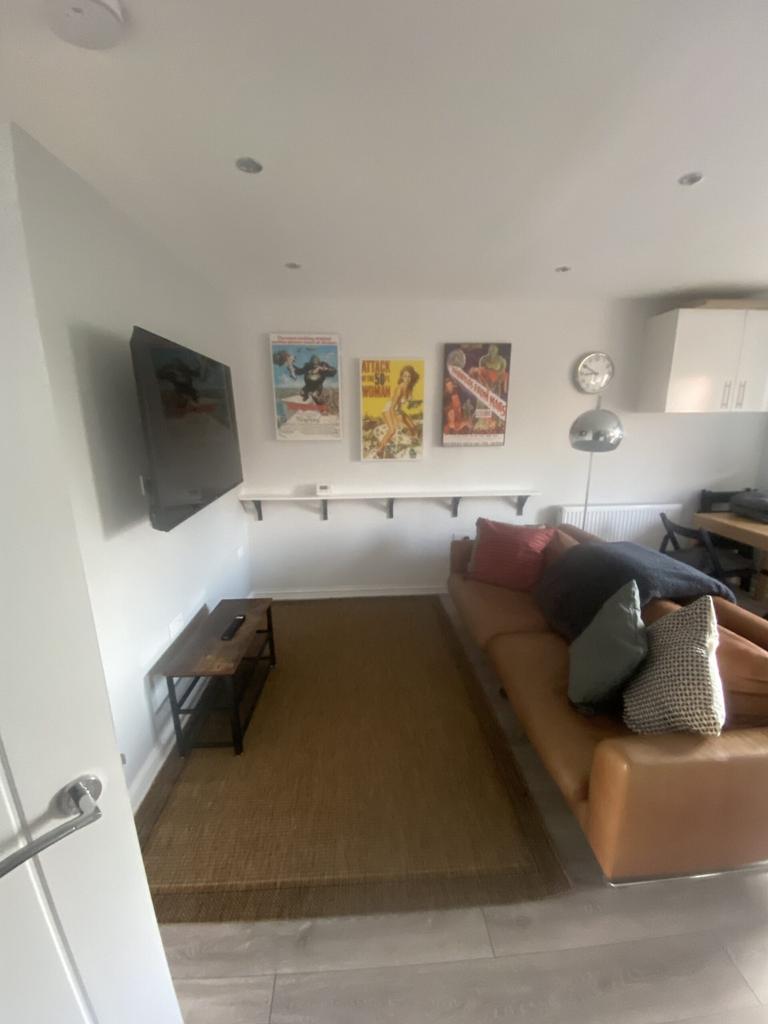 A stylish and inviting living room with modern ...