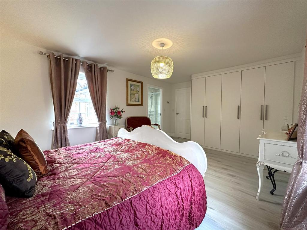 Bedroom One With Fitted Wardrobes 207