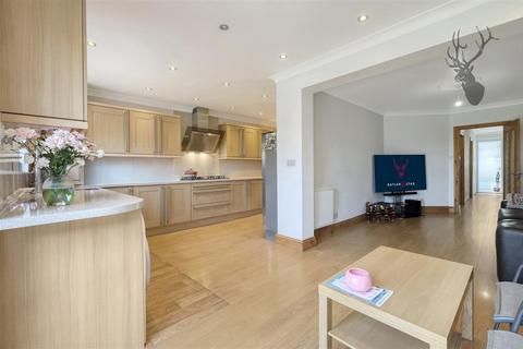 60 New Road, London, E4 8ET