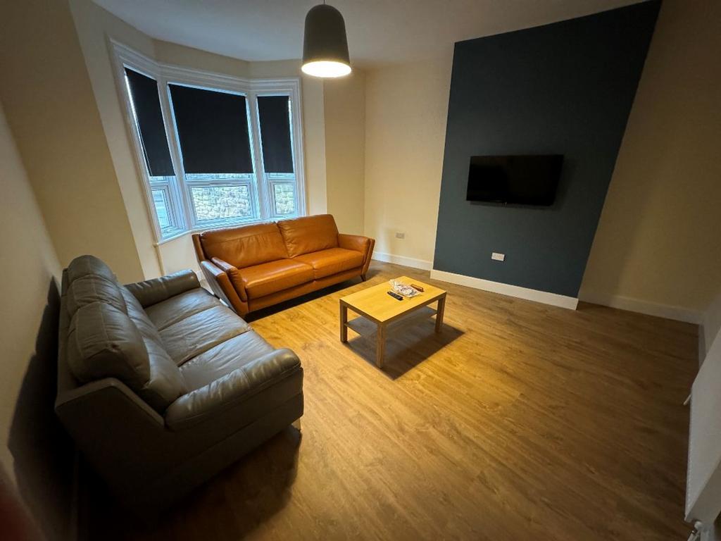 A stylish and inviting living room featuring a ...