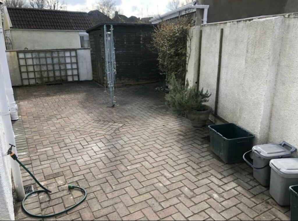 A spacious garden area, perfect for outdoor rel...